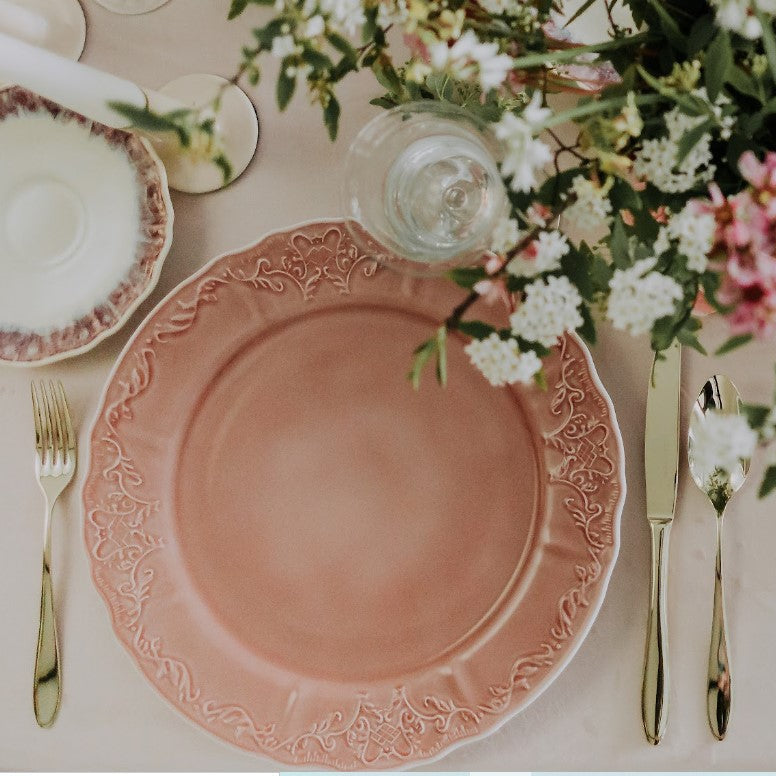 Belo Inox Belo 6 cutlery set styled on an elegant pink table setting with floral décor