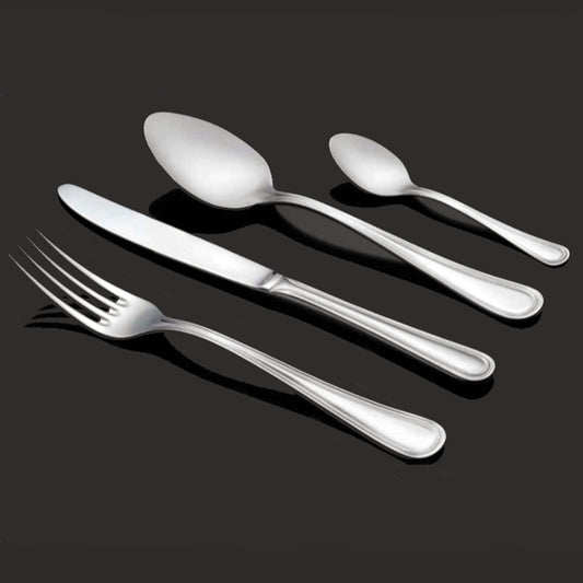 Bright Kitchen Silverline cutlery set in stainless steel displayed in a minimalist flatlay on a black background