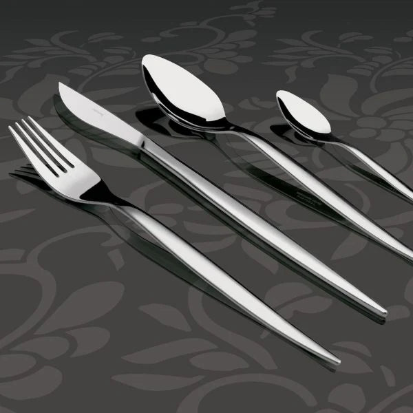 Herdmar Tiffany 18/10 stainless steel cutlery set – fork, knife, and spoons with mirror-polished finish displayed on an elegant dark floral background.