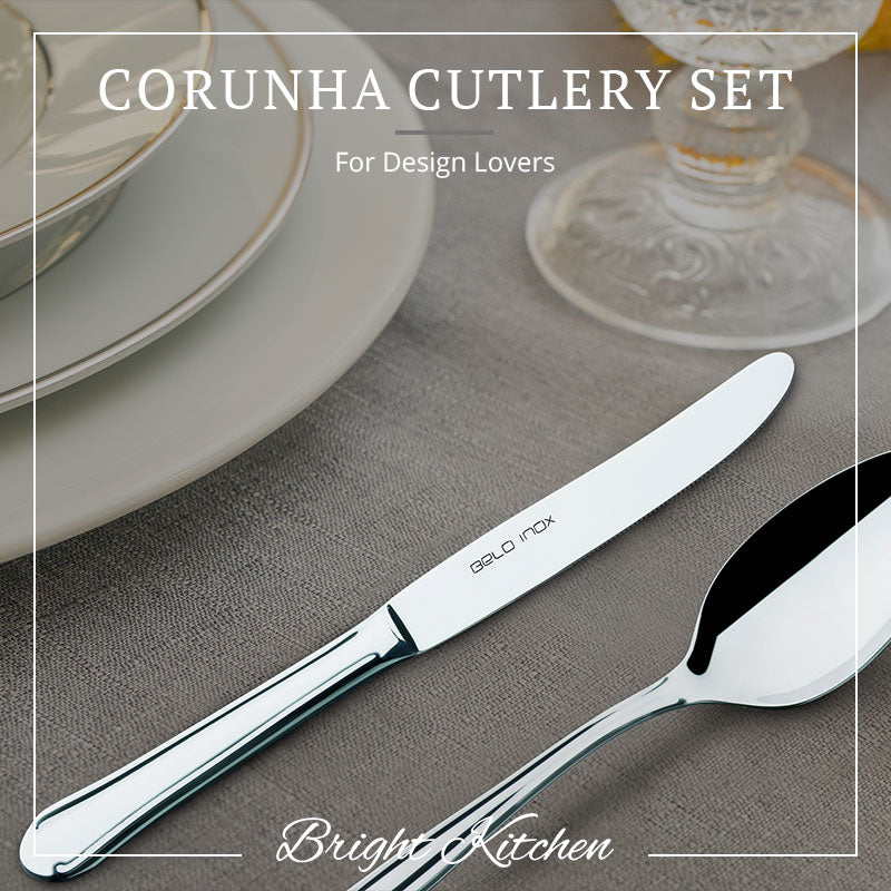 Belo Inox Corunha cutlery set displayed in an elegant table setting with classic stainless steel design. Handcrafted in Portuga