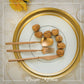 Elegant Belo Inox Vértice matte copper flatware on a contemporary table setting by Bright Kitchen